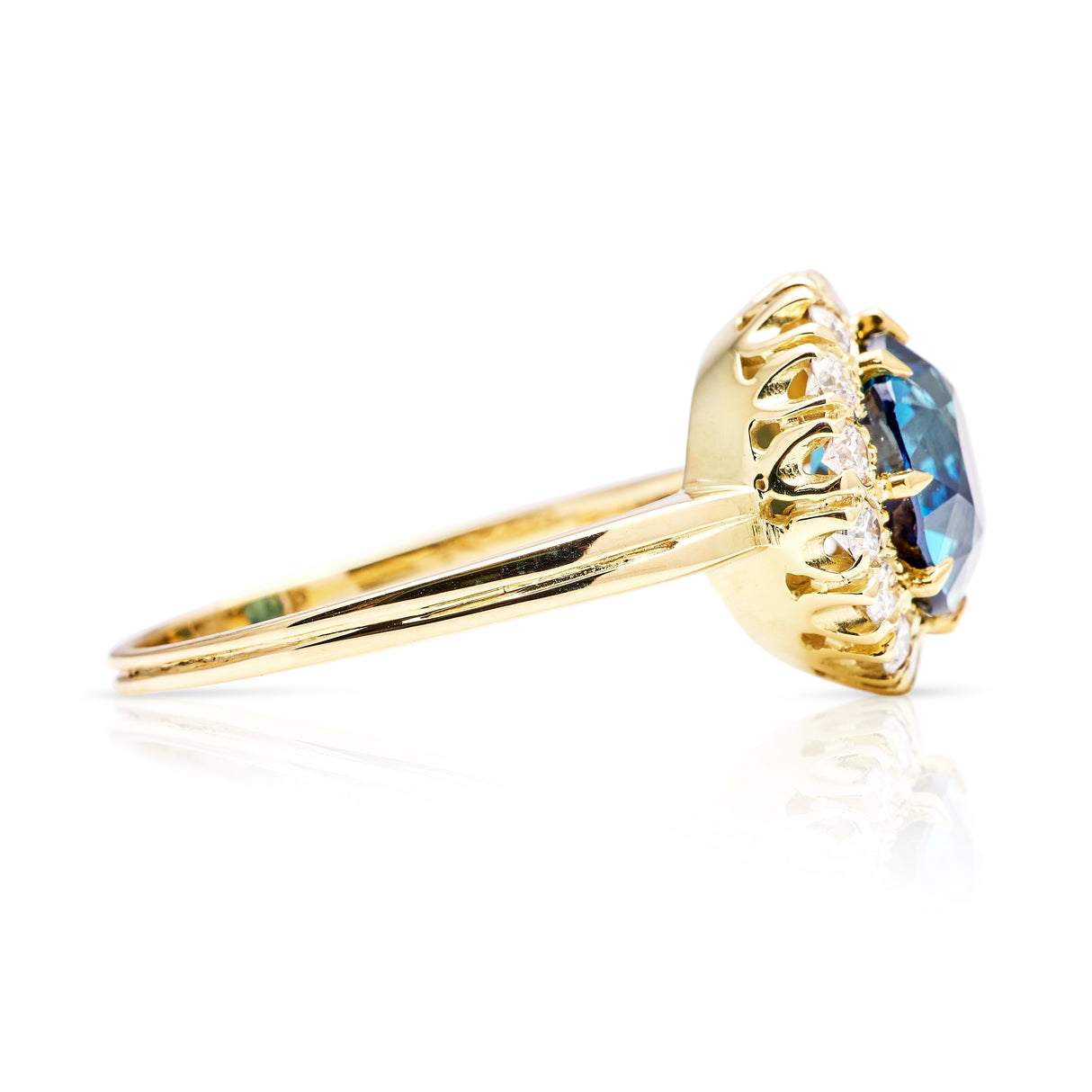 Vintage, teal blue sapphire and diamond cluster ring, 18ct yellow gold