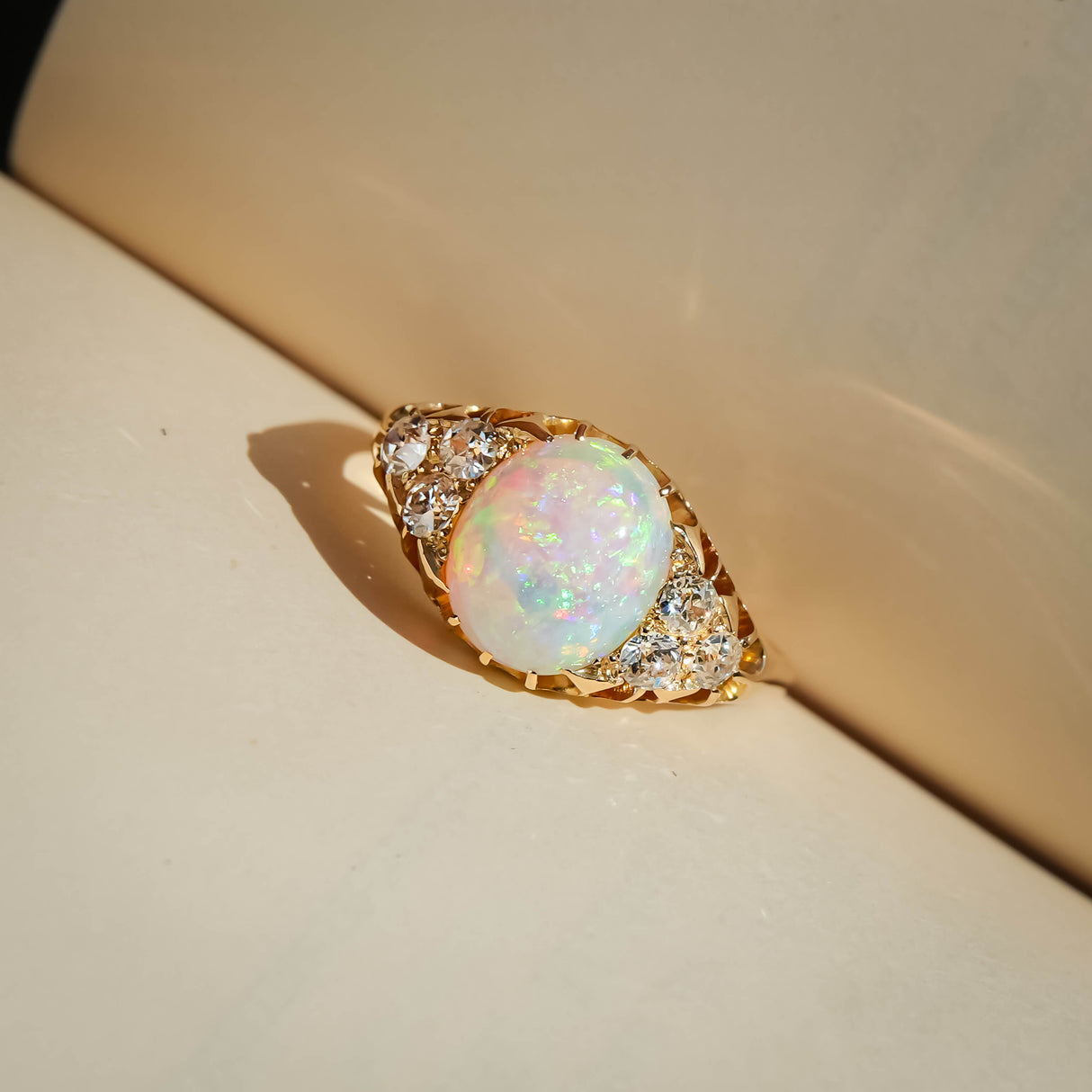 victorian cabochon opal and diamond ring with yellow gold setting