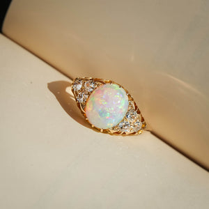 victorian cabochon opal and diamond ring with yellow gold setting