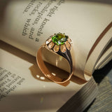 Victorian green zircon solitaire ring with round green gemstone in gold