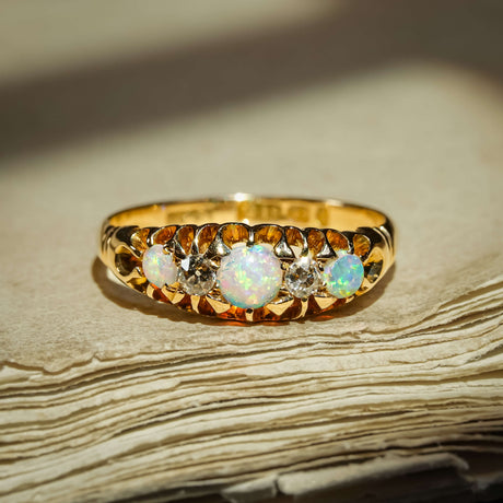 Late Victorian opal and diamond five stone ring with central opal and diamond details in gold