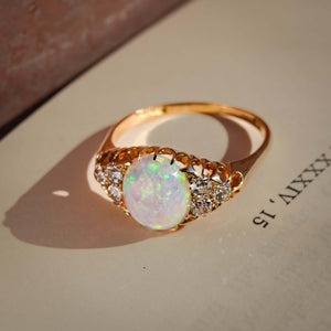 victorian opal diamond ring with cabochon opal and yellow gold band