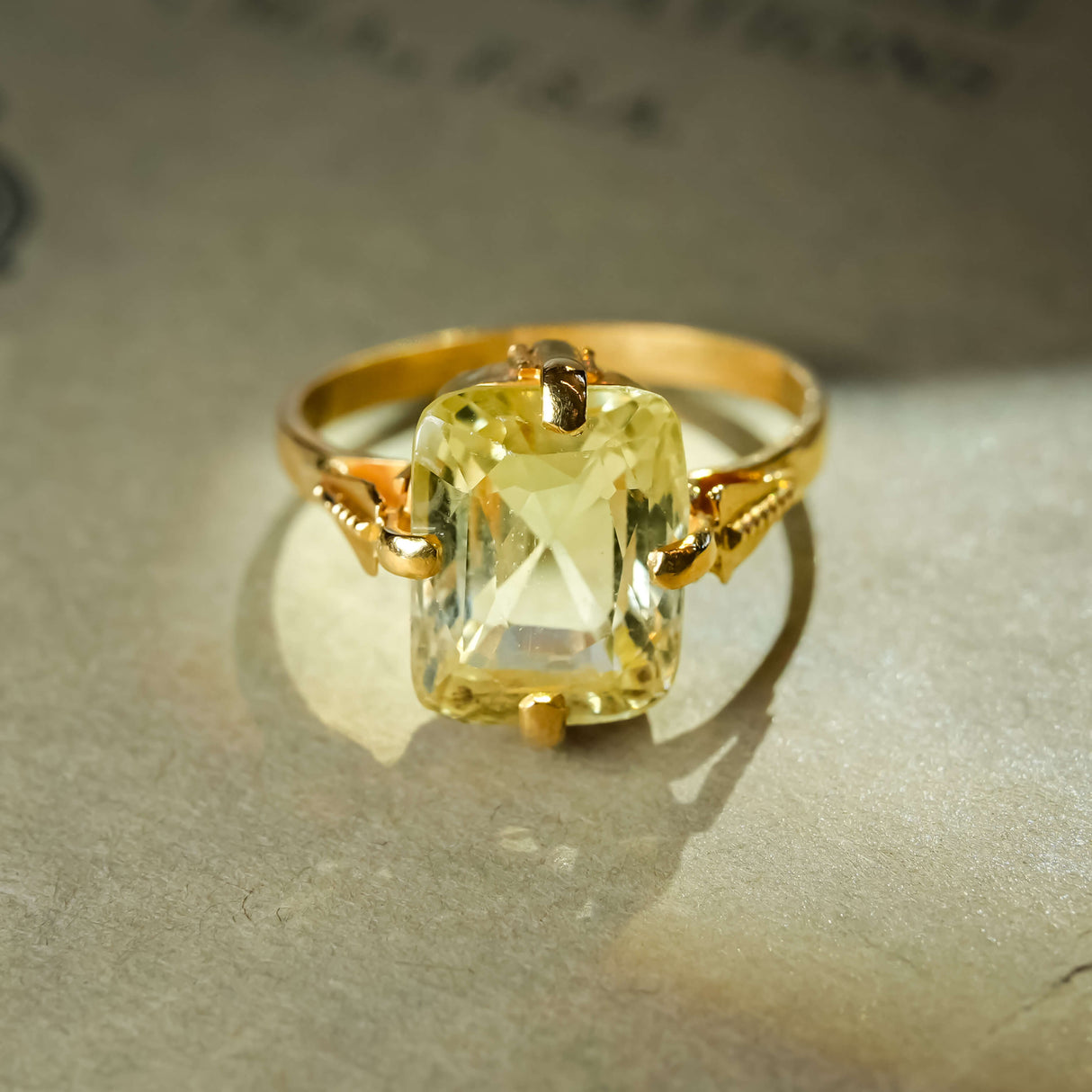 Victorian yellow sapphire solitaire ring set in yellow gold with claw setting