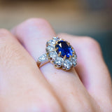 Vintage 1960s French sapphire and diamond cluster ring with sparkling diamond halo and rich blue sapphire centre.
