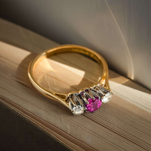 vintage 1960s ruby and diamond three stone ring in yellow gold