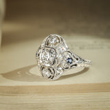Vintage Art Deco diamond cluster ring with sapphire details