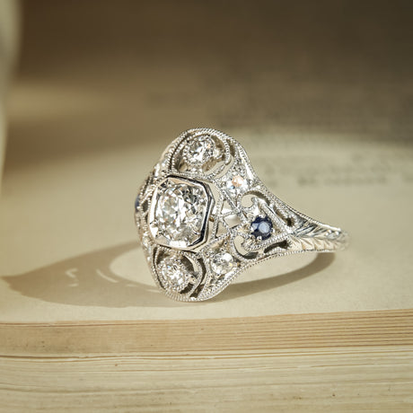 Vintage Art Deco diamond cluster ring with sapphire details