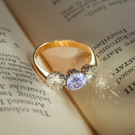 Vintage Edwardian sapphire and diamond three stone ring in gold band