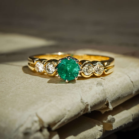 Vintage 1990s emerald and diamond five stone ring with green emerald and diamond set band