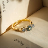 vintage green sapphire diamond three stone engagement ring from the 1950s
