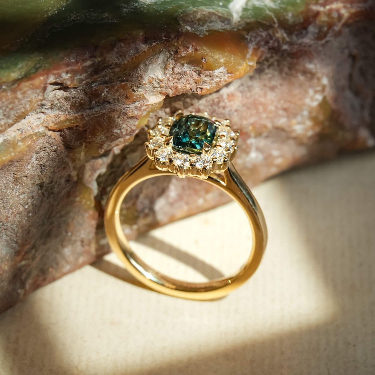 Green sapphire and diamond cluster ring with classic design in gold