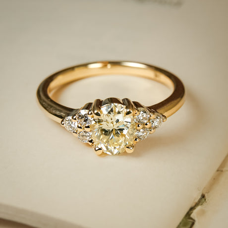 Yellow diamond trefoil cluster ring with gold band