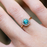 Zircon and diamond cluster ring close detail showing bright blue centre stone.