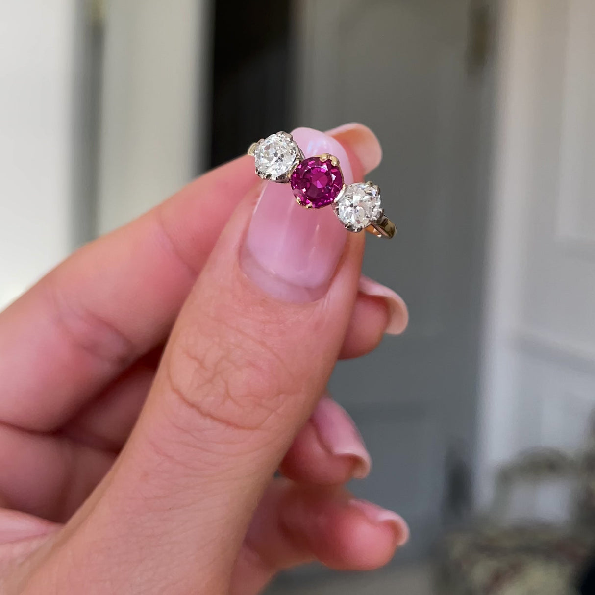 Edwardian, 18ct gold, platinum, ruby and diamond three-stone ring