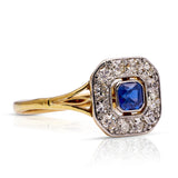 Sapphire and diamond engagement ring, side view.