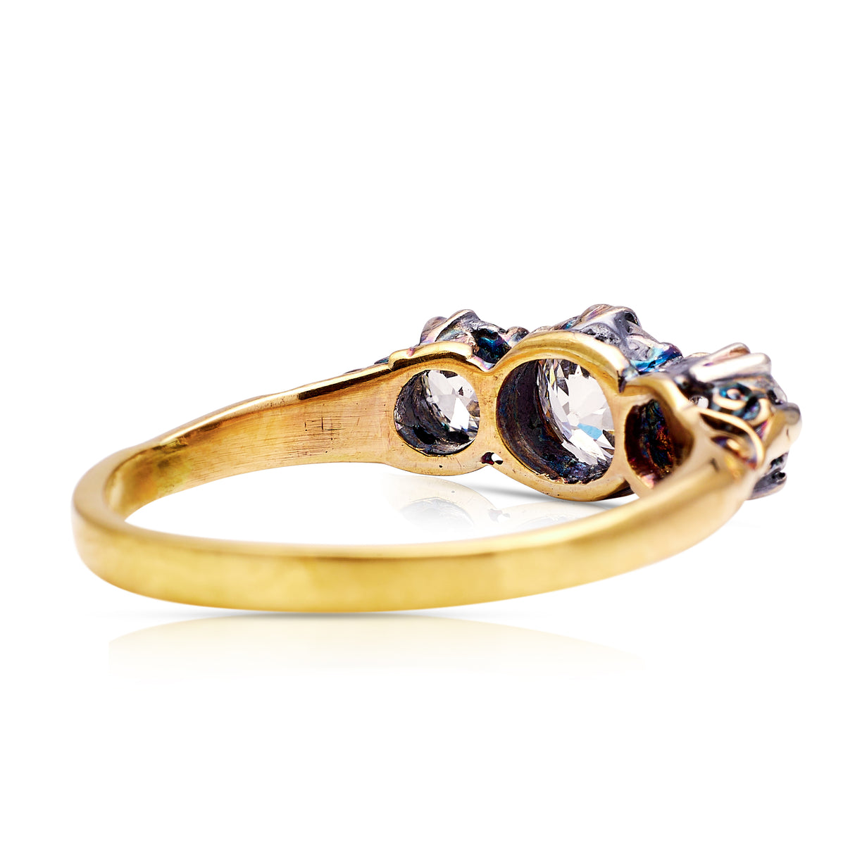 Antique Edwardian three-stone diamond engagement ring, rear view. 