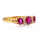 Victorian three-stone ruby and diamond engagement ring, side view. 