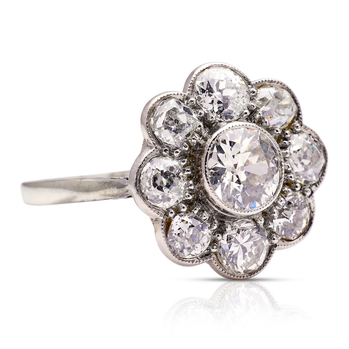 Diamond daisy cluster ring, side view. 