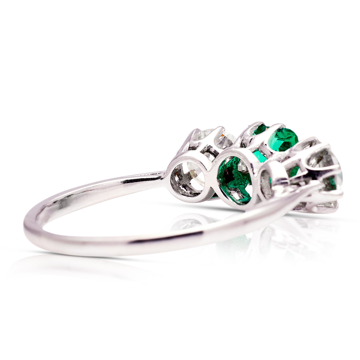 Vintage Art Deco three-stone emerald and diamond engagement ring, rear view. 
