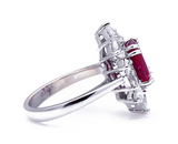 18ct White Gold, ‘Pigeon’s Blood’ 4.27ct Ruby and Diamond Cluster Ring