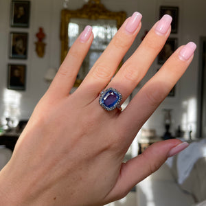 Early Victorian sapphire and diamond engagement ring, worn on hand.