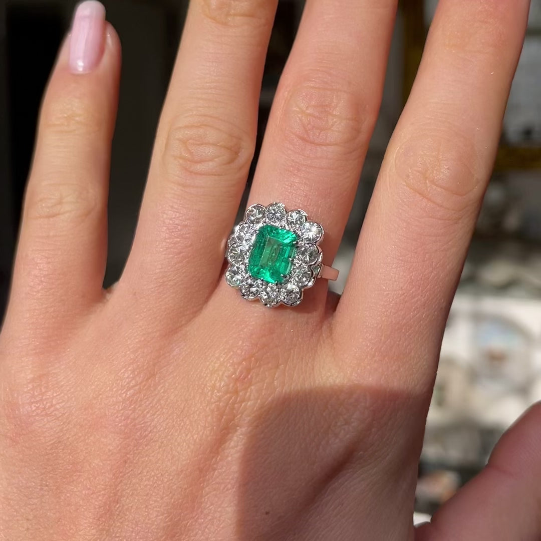 Engagement | 18ct white gold, Colombian emerald and diamond cluster ring