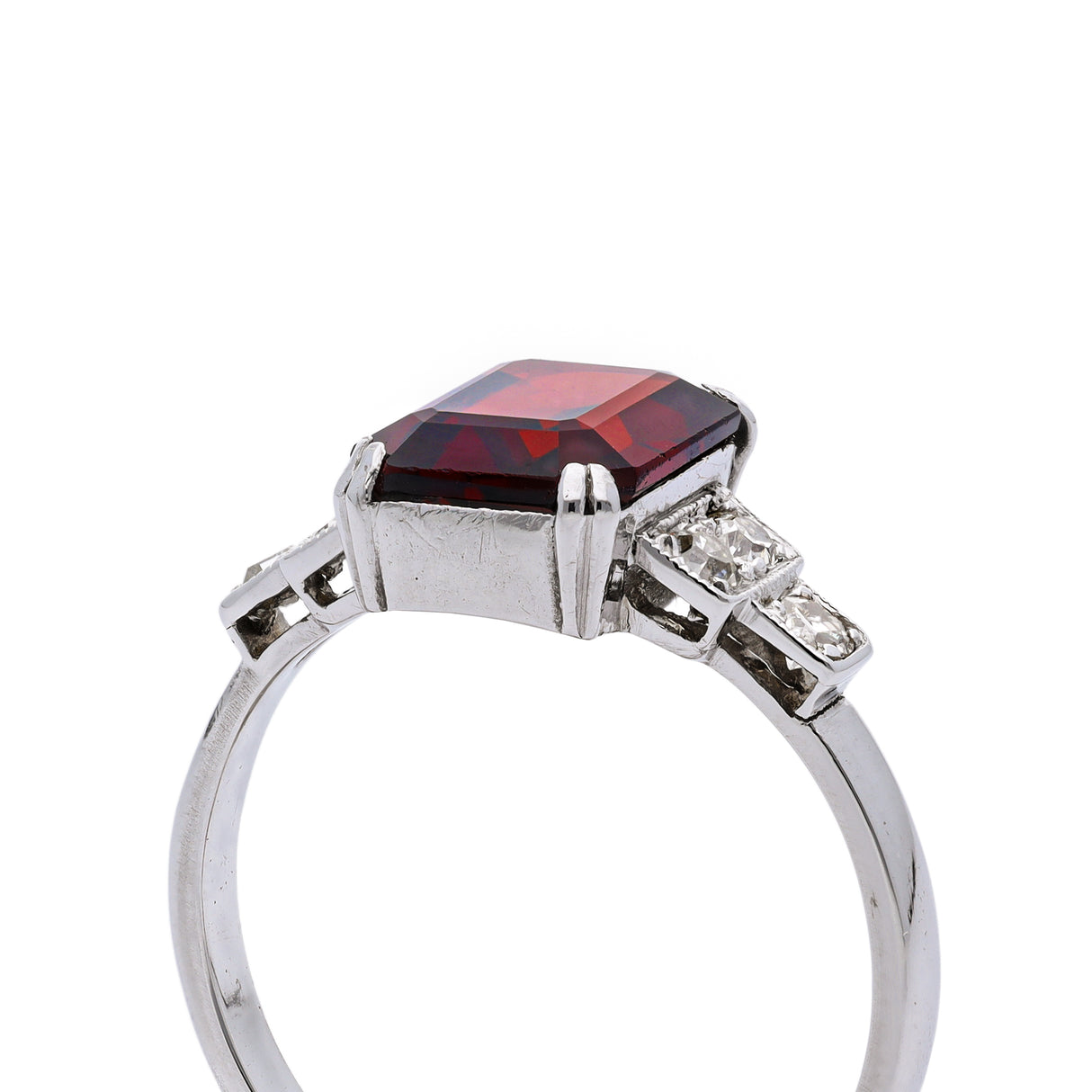 Art Deco garnet and diamond engagement ring, side view.