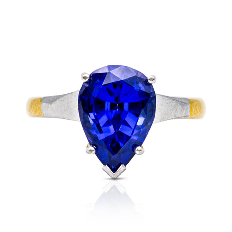 Blue tanzanite single stone ring, front view.