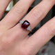Art Deco garnet and diamond engagement ring, worn on hand and moved around to give perspective.
