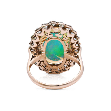 A Rare Natural Cabochon Crystal Opal and Paste Cluster Ring, circa 1900