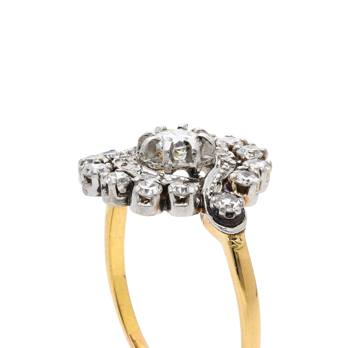 Antique French diamond cluster engagement ring, side view.