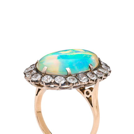 A Rare Natural Cabochon Crystal Opal and Paste Cluster Ring, circa 1900