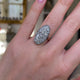 Victorian diamond panel navette ring, worn on hand and rotated to give perspective.