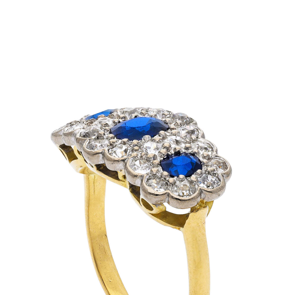 Antique sapphire and diamond triple cluster ring, side view. 