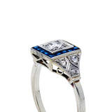 Vintage sapphire and diamond engagement ring, side view.