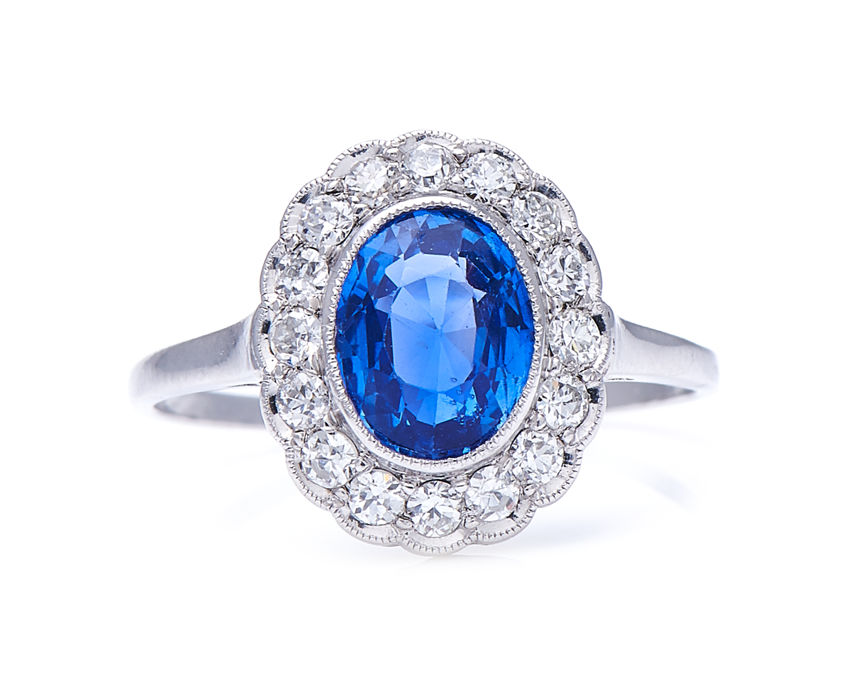 Antique, Edwardian, platinum, natural ‘cornflower’ ceylon sapphire and diamond cluster ring
