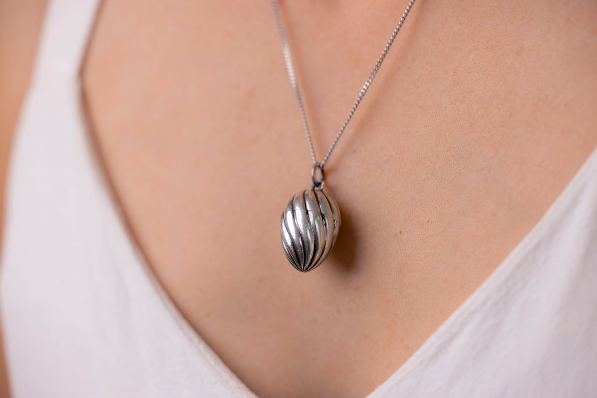 19th Century | Silver Egg Locket,  With Original French Notes