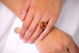 An impressive cabochon agate ring, set in 18ct gold