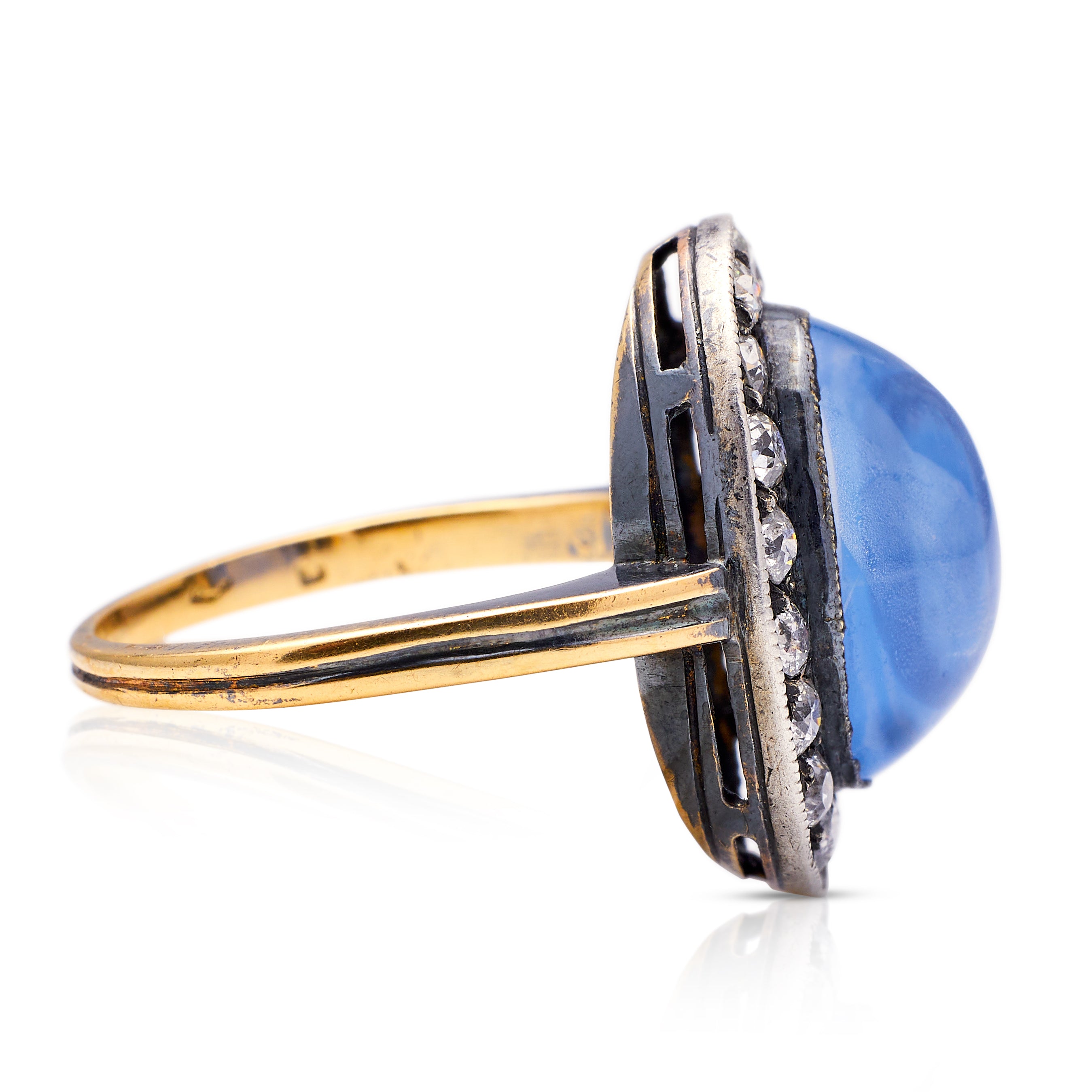 Antique, Edwardian cabochon sapphire & diamond cluster ring