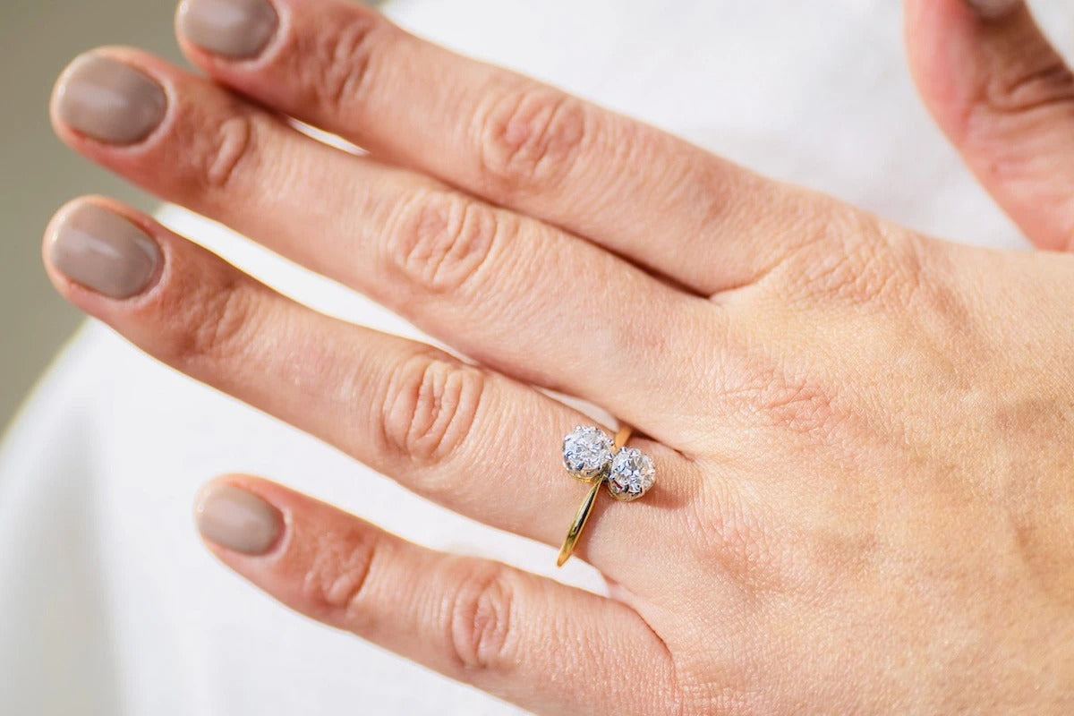 Antique Edwardian, 18ct gold, platinum, two stone diamond engagement ring