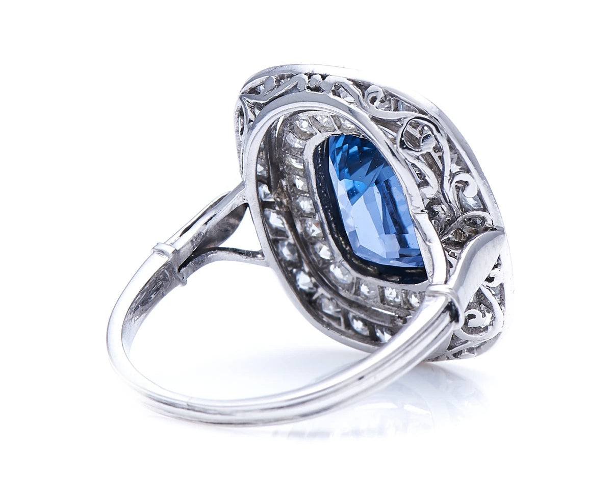 Edwardian, Platinum, Natural ‘Cornflower’ Ceylon Sapphire and Double Row Diamond Cluster Ring
