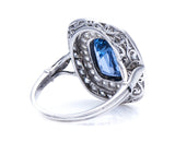 Edwardian, Platinum, Natural ‘Cornflower’ Ceylon Sapphire and Double Row Diamond Cluster Ring