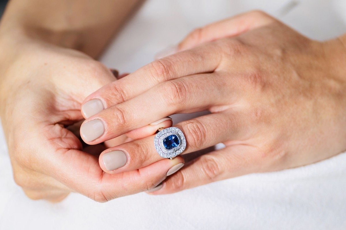 Edwardian, Platinum, Natural ‘Cornflower’ Ceylon Sapphire and Double Row Diamond Cluster Ring