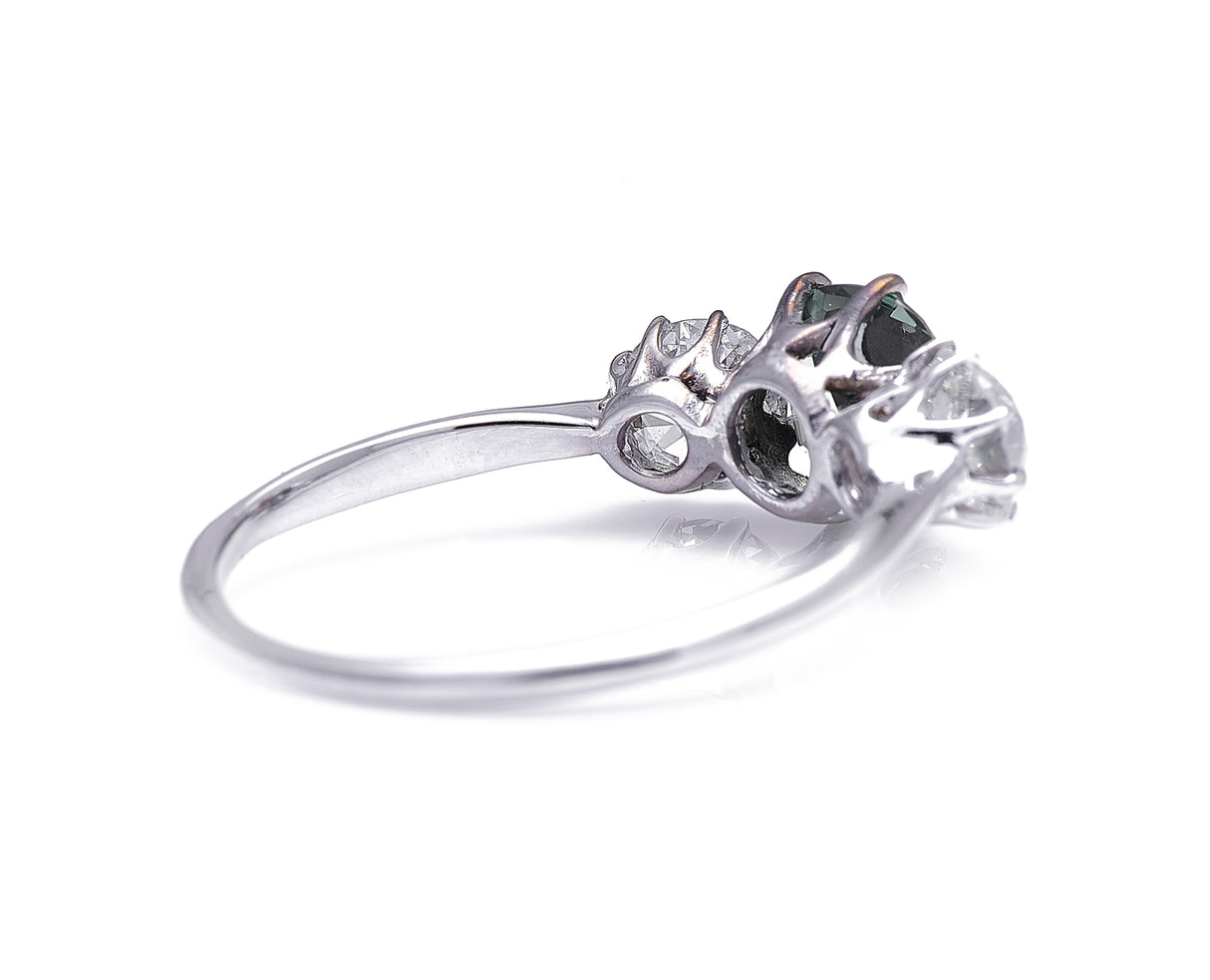 Art Deco, platinum, green sapphire and diamond three stone ring