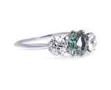 Art Deco, platinum, green sapphire and diamond three stone ring