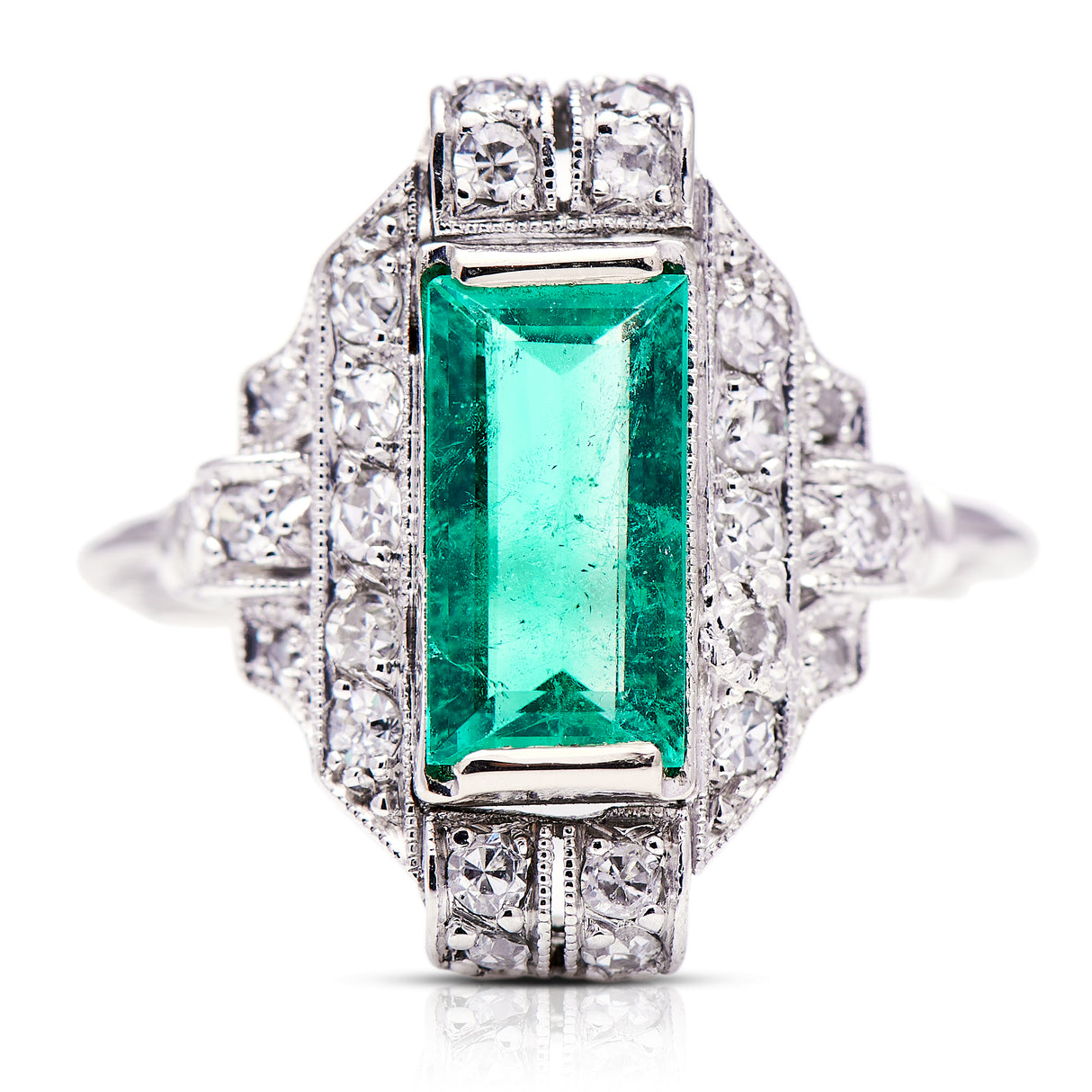 Emerald and diamond ring, circa 1900. Emerald Rings | Emerald Jewellery | Antique Emerald Rings | Antique Engagement rings | Emerald Engagement Rings | Diamond Rings | Diamond Engagement rings | UK Antique Jewellers | Art Deco Rings | Art Deco Jewellery | Cluster Rings | Antique Cluster