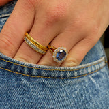 Victorian, sapphire and diamond cluster engagement ring, worn on hand.
