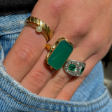 Art Deco chrysoprase and yellow gold ring, worn on hand.