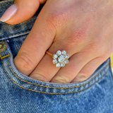 Edwardian | 18ct gold, diamond daisy cluster ring