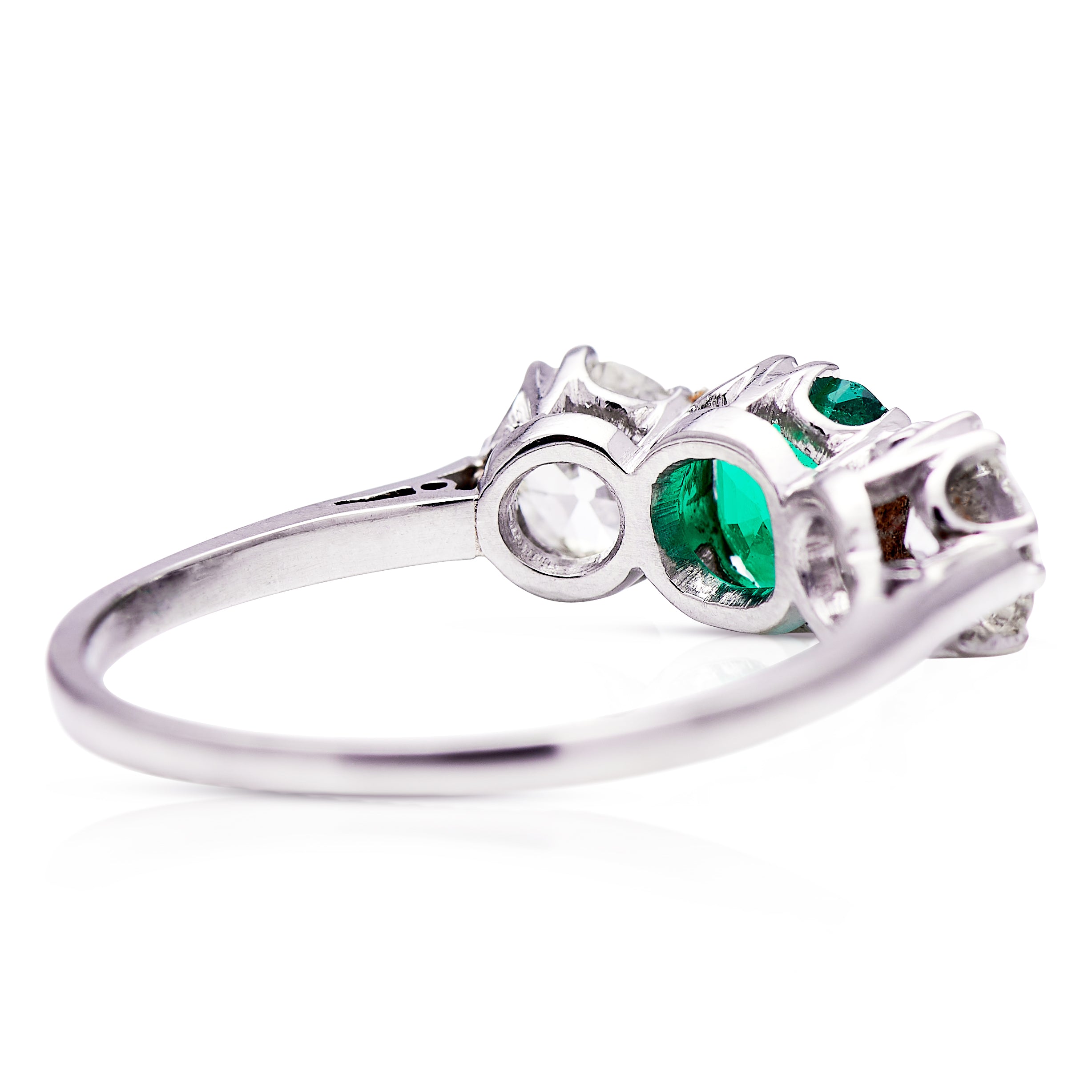  three stone, platinum, diamond and emerald ring rear side view